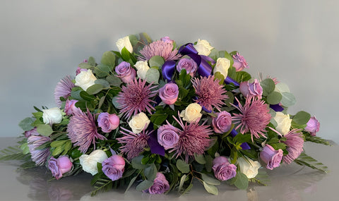 #171 Lavender Embrace Half Casket Spray