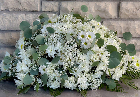 #209 Field of Daisies Half Casket Spray