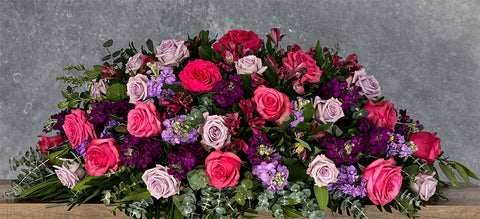 #13 Lavender and Pink Tribute Casket Spray