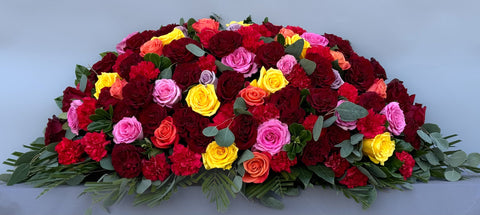 #103 Sunset Embrace Half Casket Spray