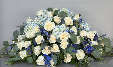 #149 Heavenly Blue Half Casket Spray