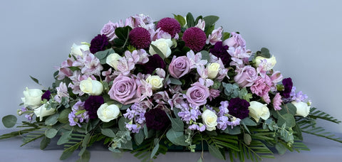 #102 Tranquil Lavender Half Casket Spray