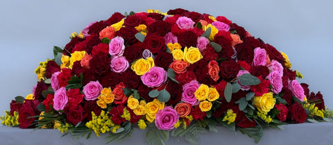 #103 Sunset Embrace Half Casket Spray