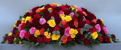 #103 Sunset Embrace Half Casket Spray