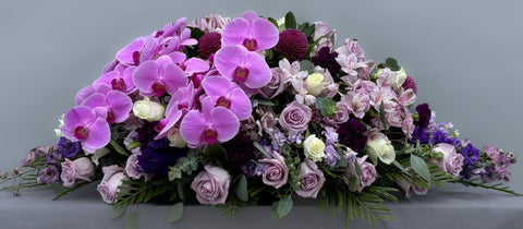 #102 Tranquil Lavender Half Casket Spray