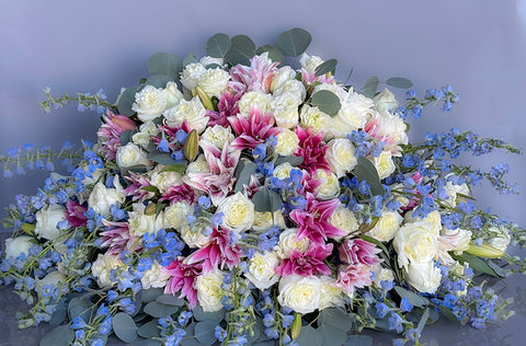 #97 Watercolor Dreams Casket Spray