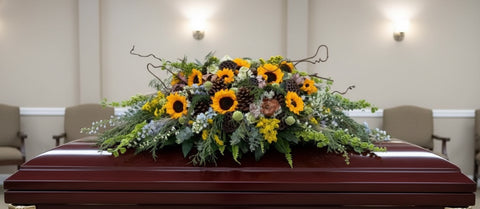 #109 Golden Meadow Half Casket Spray