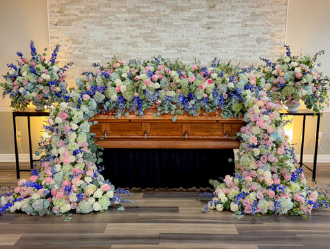 # 269 Full Cascading Casket Floral Installation in Pink, Blue & White – Luxury Tribute by Marchello’s Floral
