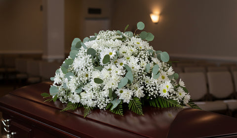 #209 Field of Daisies Half Casket Spray